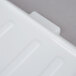 A close-up of a Vollrath white plastic container lid.