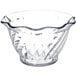 A clear polycarbonate Carlisle tulip berry dish with a wavy edge.