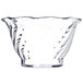 A clear polycarbonate tulip berry dish with a wavy edge.