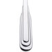 A close-up of a Oneida Cityscape stainless steel spoon with a white background.