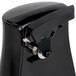 A black Proctor Silex electric can opener with a knife sharpener on a counter.