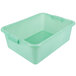 A green plastic Vollrath Color-Mate food storage container with handles and a recessed lid.
