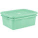 A green plastic Vollrath Traex food storage container with a lid.