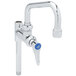 A T&S chrome pre-rinse add-on nozzle with blue quarter turn handles.