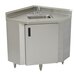 A stainless steel corner sink cabinet with a stainless steel sink and door.