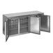 A stainless steel Beverage-Air back bar refrigerator with three solid doors.