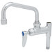 A T&S chrome pre-rinse add-on nozzle with a silver and blue handle.