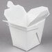 A white Fold-Pak Chinese take-out container with the lid open.