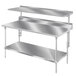 A silver metal table mounted Advance Tabco stainless steel shelf above a counter.
