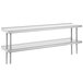 A stainless steel Advance Tabco rear mounted double deck table shelving unit.