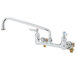 A chrome T&S wall mount pantry faucet with two handles and a 12" swing nozzle.