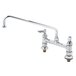 A chrome T&S deck-mounted pantry faucet with two levers.