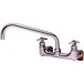 A chrome T&S wall mount faucet with two handles and a swing nozzle.