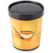 A yellow and orange Huhtamaki paper cup with a black lid.