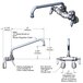 A diagram of a T&S wall mount pantry faucet with adjustable centers and a 12" swing nozzle.