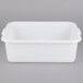 A white Tablecraft plastic drain box with handles.