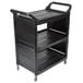 A black Rubbermaid plastic cart with three shelves.