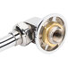 A chrome plated metal T&S wall mount swing nozzle with a brass nut.