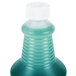 A green Unger EasyGlide glass cleaner bottle with a white cap.