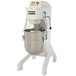 A white Doyon commercial floor mixer with a metal bowl and guard.