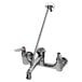 A T&S polished chrome wall mount mop sink faucet with two handles and a sprayer.