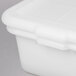 A close up of a white Tablecraft plastic container with a lid.
