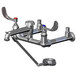 A T&S polished chrome wall mount service sink faucet with 2 wrist action handles.