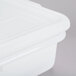 A close-up of a Tablecraft white plastic freezer safe drain box combo.