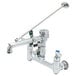 A T&S chrome wall mount mop sink faucet with long silver handles.