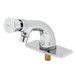 A T&amp;S chrome metering faucet with push button cap.