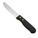 An American Metalcraft jumbo stainless steel steak knife with a black plastic handle.