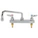 A T&S chrome deck-mount workboard faucet with two handles and a 14" swing nozzle.