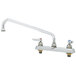 A T&S chrome deck-mount workboard faucet with two handles and a 10" swing nozzle.