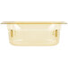 A yellow plastic Vollrath Super Pan with a lid.