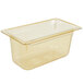 A Vollrath Super Pan 1/3 size amber plastic food pan with a lid.