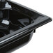 A Vollrath 1/3 size black plastic food pan with lid.