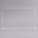 A clear plastic bakery tray on a white surface.