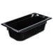 A Vollrath black high heat plastic food pan on a counter.