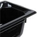A Vollrath black plastic food pan with a lid.