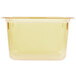 A clear rectangular Vollrath amber plastic food pan with a lid.