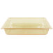 A yellow rectangular Vollrath plastic food pan with lid.