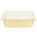 A Vollrath Super Pan 1/2 Size Amber High Heat Plastic Food Pan with a lid on a white counter.
