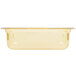 A clear plastic Vollrath Super Pan with a gold lid.