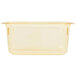 A clear plastic container with a yellow lid containing a yellow Vollrath Super Pan.