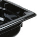 A black Vollrath plastic food pan with a lid.