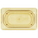 A clear plastic Vollrath 1/9 size food pan with amber color.