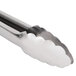 A close-up of Tablecraft 12" Ergonomic Locking Tongs with a cloud-shaped handle.