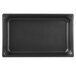 A black rectangular Vollrath Super Pan 3 with a white background.