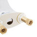 A white T&S single lever faucet with gold metal parts.