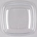 A clear square plastic container with a white lid.